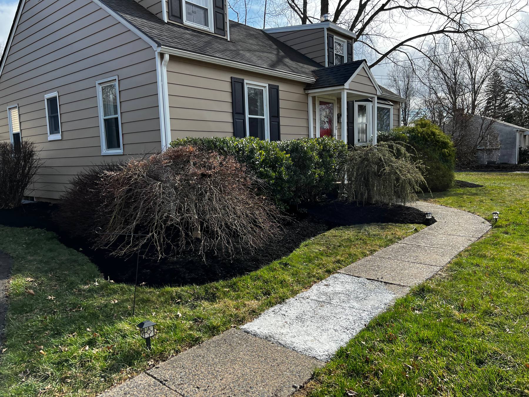 Mulch bed refresh for a Sellersville home