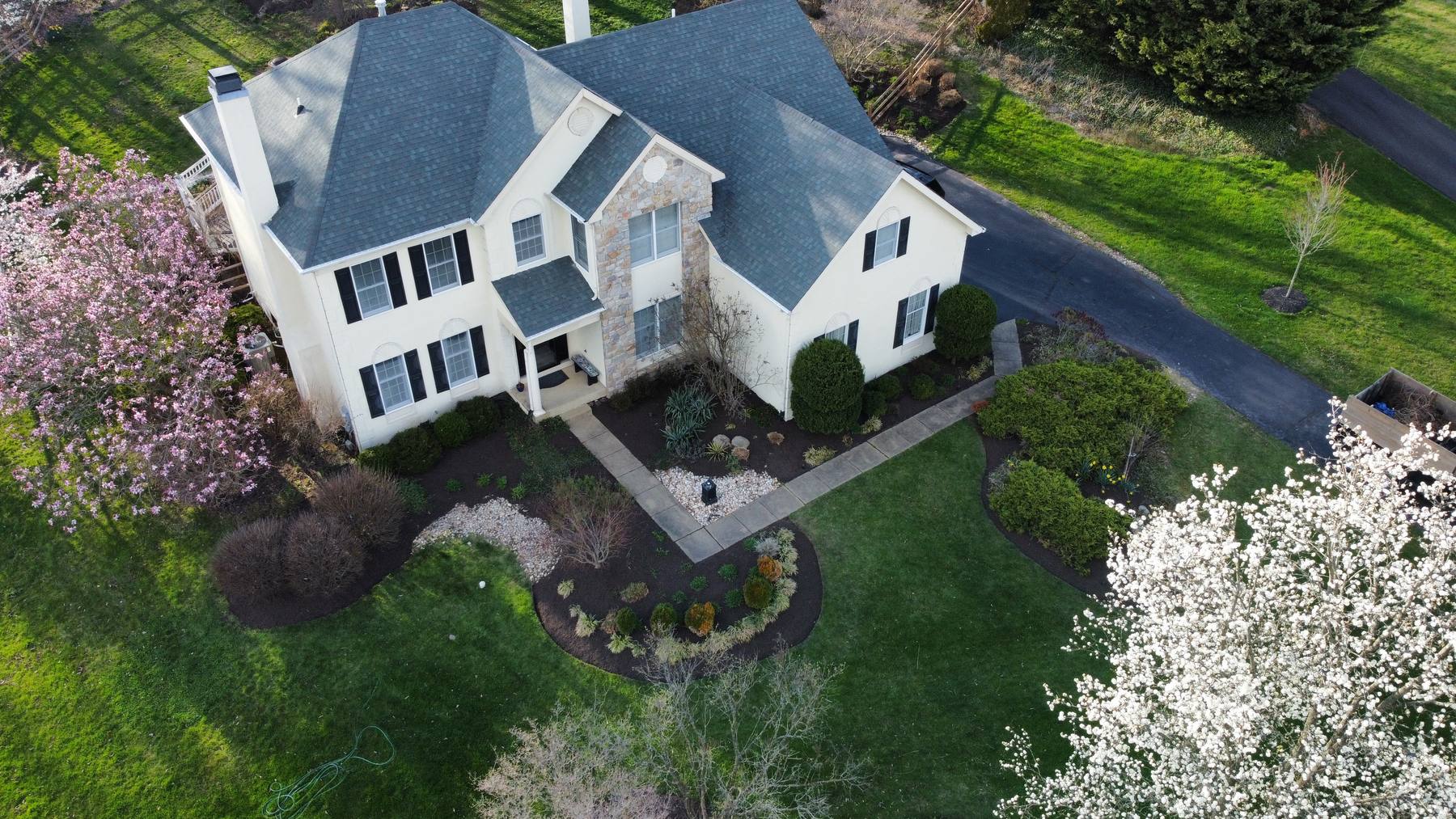 Aerial view of fresh mulch work on a residential property