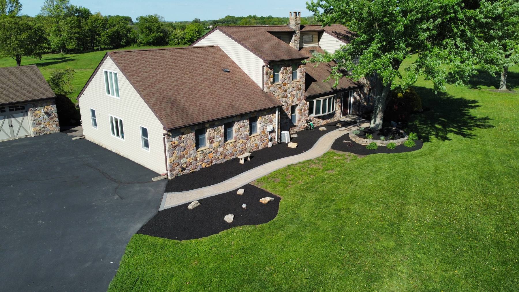 Aerial view of mulch and bed work on an Upper Bucks property